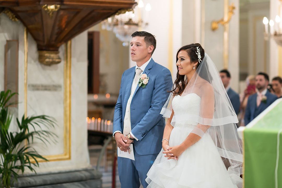 bride and groom in curch positano